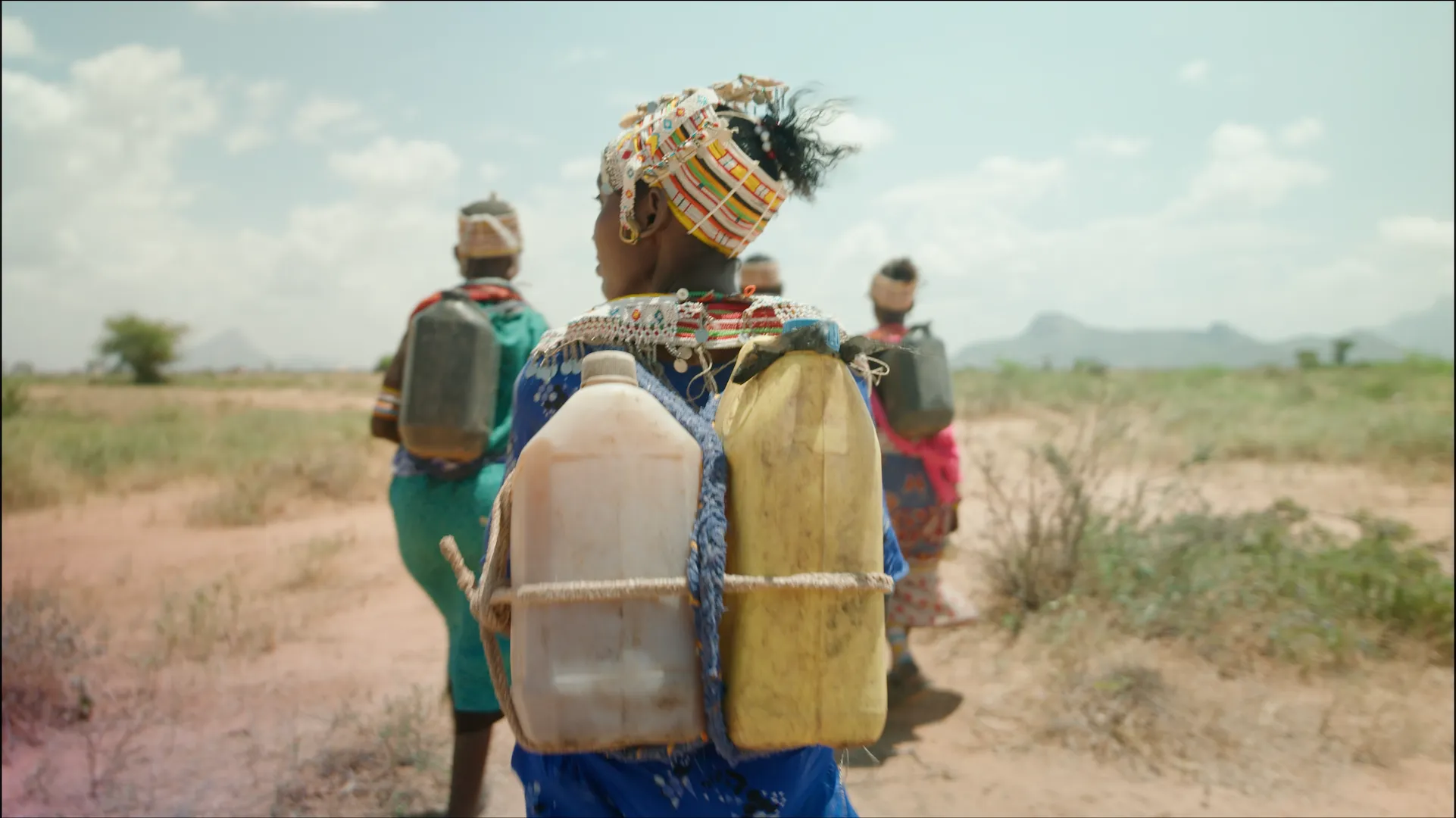 Women in Kenya carrying water